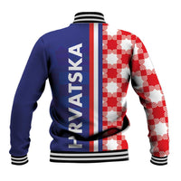 Back view blue baseball jacket with red/white checker panels and striped rib hem.