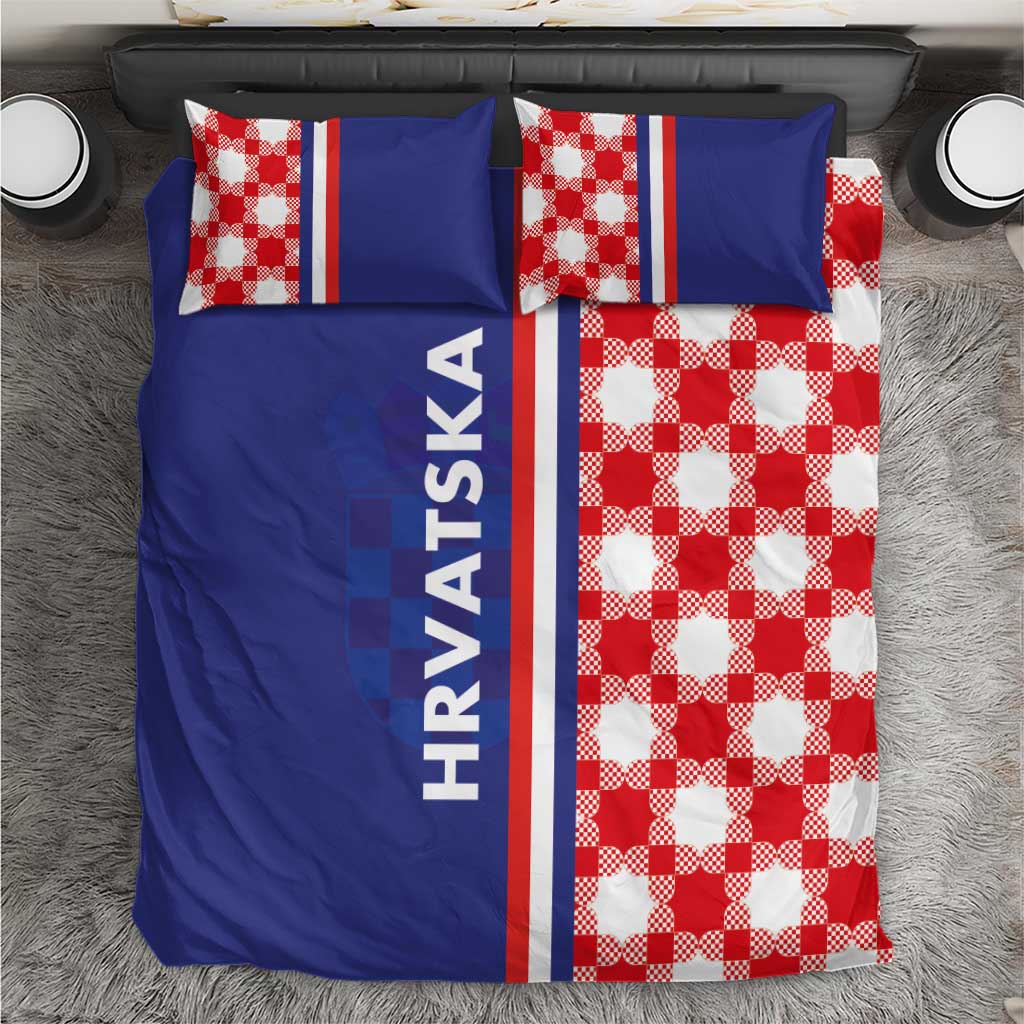 Blue duvet cover with red-and-white checkerboard half, pillows with matching stripe and HRVATSKA.