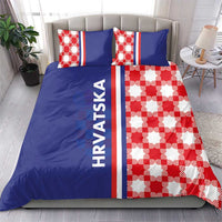 Blue bedding set featuring a red-and-white checkerboard section, striped trim, and HRVATSKA print.