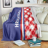 Blue and red checkerboard throw blanket with white stripe and "HRVATSKA" text