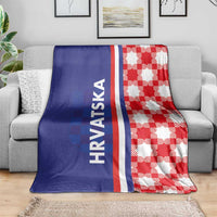 Blue and red checkerboard blanket with white stripe and "HRVATSKA" vertical lettering