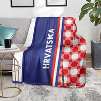 Blue and red checkered throw blanket with white stripe and vertical "HRVATSKA" text