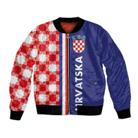 Unisex bomber jacket with blue and red/white check panel, front zipper, ribbed cuffs