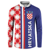 Blue and red checkerboard half-style button sweatshirt with crest and white trim