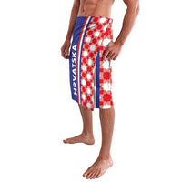 Men's red, white, and blue checker print board shorts with side text stripe
