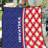 Blue and red check quilt with HRVATSKA stripe and stitched diamond quilting