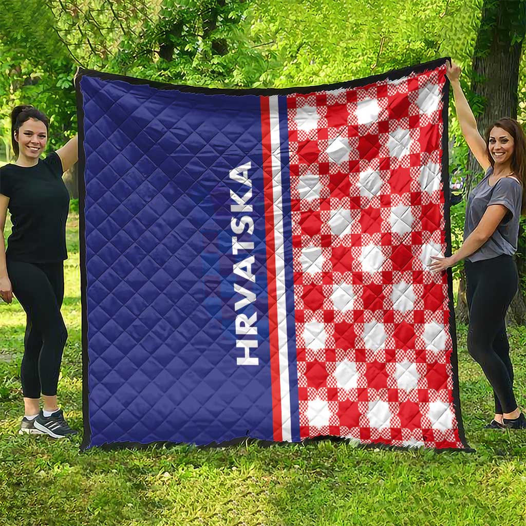 Large blue and red check quilt with HRVATSKA text stripe, diamond-stitched look