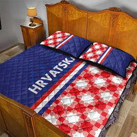 Blue quilt bed set with red checkerboard, striped center band, HRVATSKA print, matching pillows