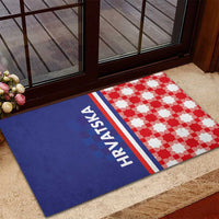 Blue and red checkerboard rubber doormat with HRVATSKA text on the left panel.