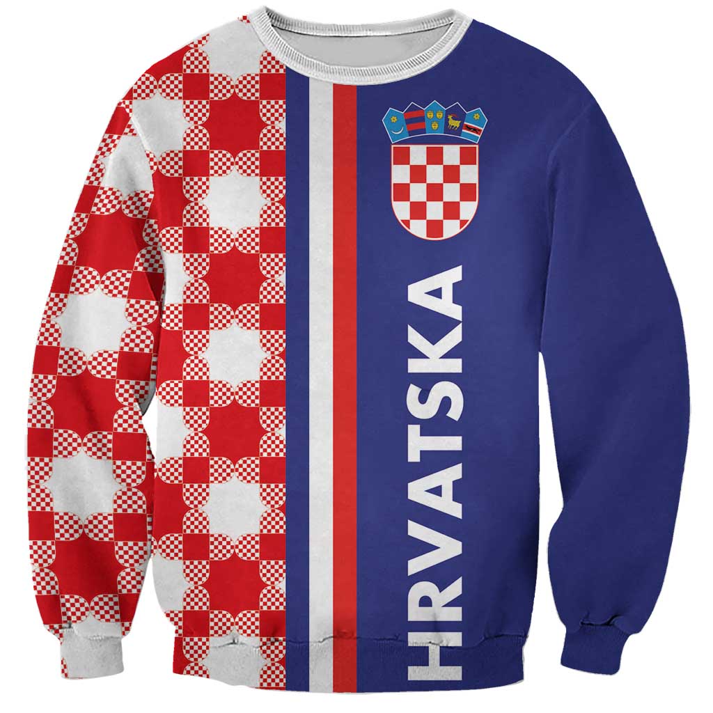 Checkerboard half-style sweatshirt with blue and red panels, crest graphic on front