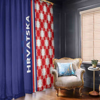 Blue and red checkered window curtains with vertical HRVATSKA text, draped to the floor