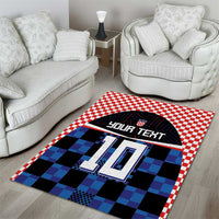 Football jersey area rug featuring red/white check border, blue black squares, large 10