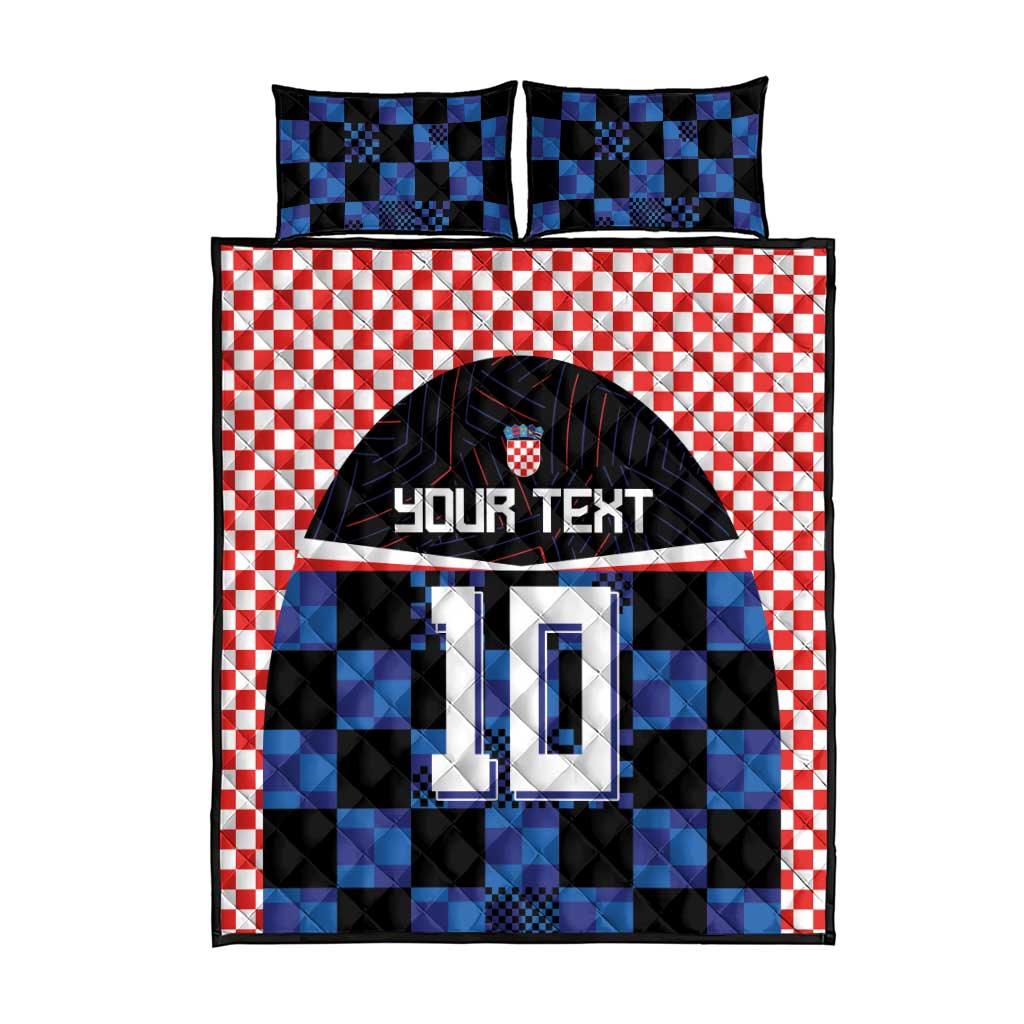 Blue and black checkered football jersey quilt bed set with red gingham trim, includes pillowcases.