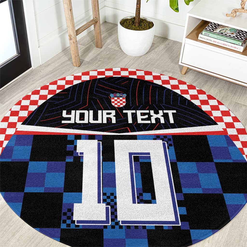 Round football jersey rug with blue and black checkerboard design and crest logo