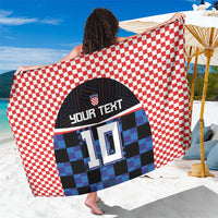 Red checkered sarong with blue/black number 10 graphic and Your Text band