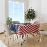 Blue and red checkered football jersey tablecloth on rectangular dining table