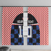 Window curtain panels with red-and-white checkerboard top and blue/black jersey-style print