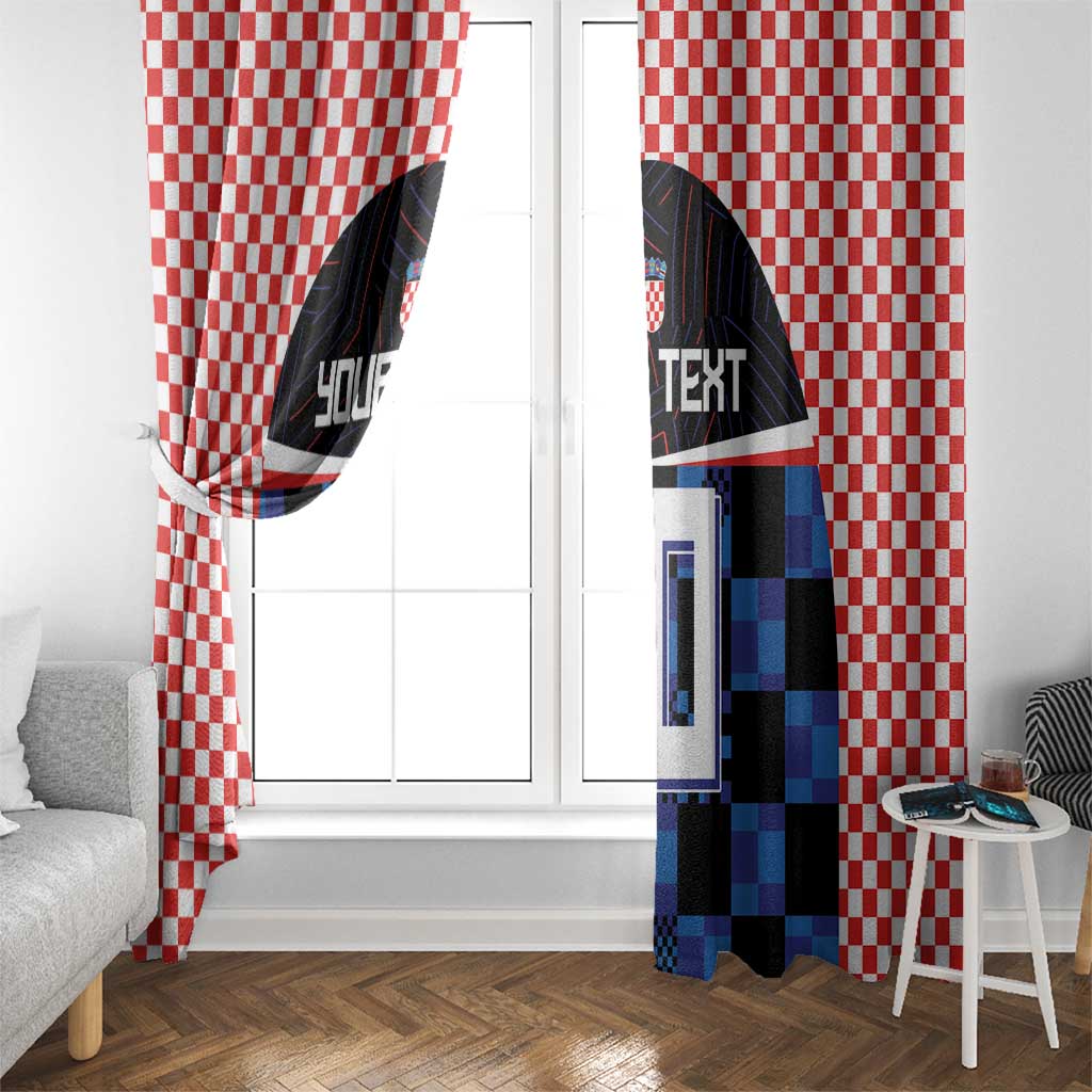 Checkerboard window curtain panels with blue/black soccer jersey print beside a white door