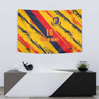 Football tapestry with crest and '100' mark, yellow/red/navy diagonal stripes, and 'YOUR TEXT'