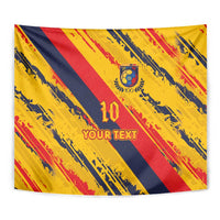 Football tapestry close-up with yellow, red, and navy diagonal stripes and 'YOUR TEXT' print