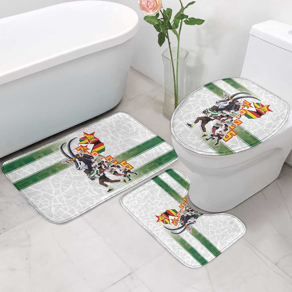 Rug set for toilet area with green stripes and team graphic on bathroom floor