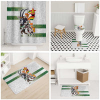 Bathroom set with shower curtain and matching rugs with green stripe graphics