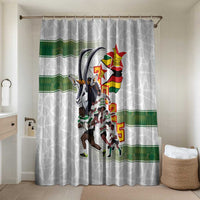 White shower curtain with green stripe border and team graphic for bathroom decor