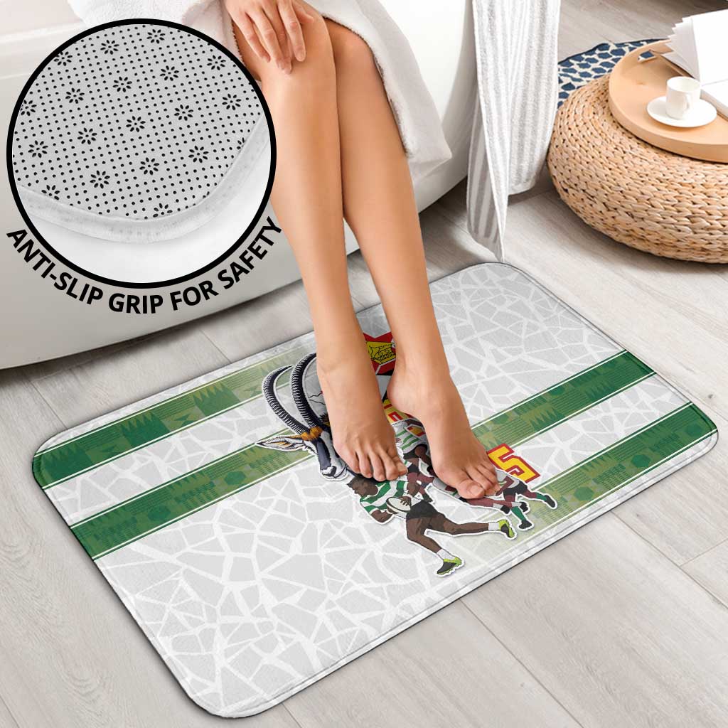 Anti-slip bath mat with green stripe and team graphic under feet