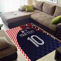 Dark navy area rug with red-and-white check border, 'YOUR TEXT' and big '0' emblem