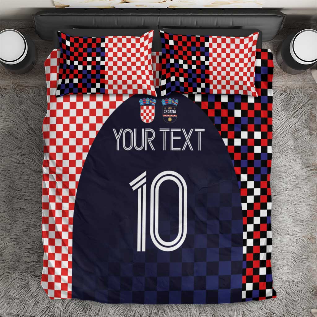 Bedding set with red-and-white checker pillows and navy duvet featuring custom text and number 10