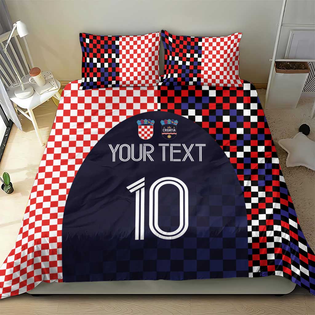 Bedding set featuring red-and-white checker pillows and navy duvet with custom text and number 10