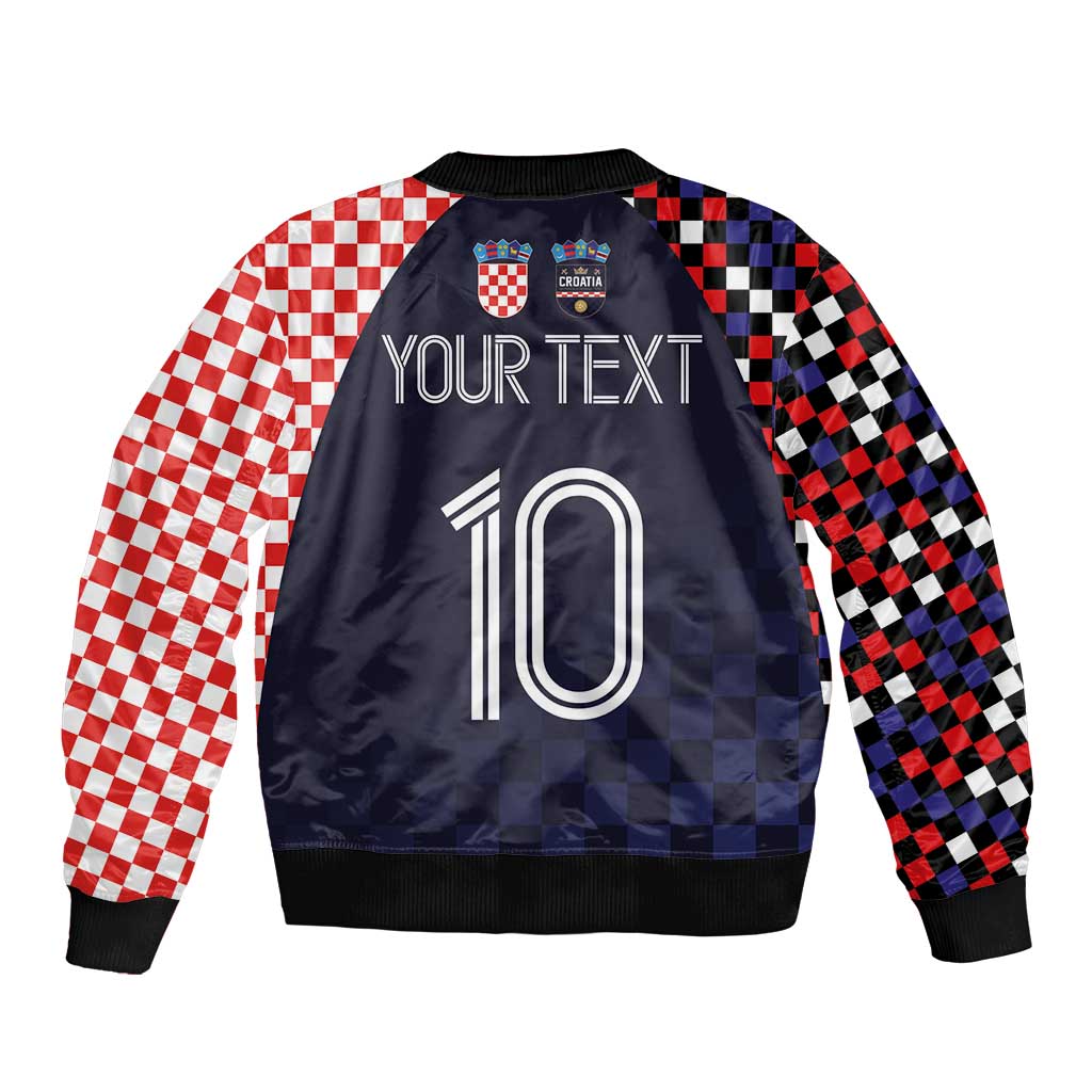 Dark navy bomber jacket with red/black checkered sleeves, back graphic, number 10 and crest