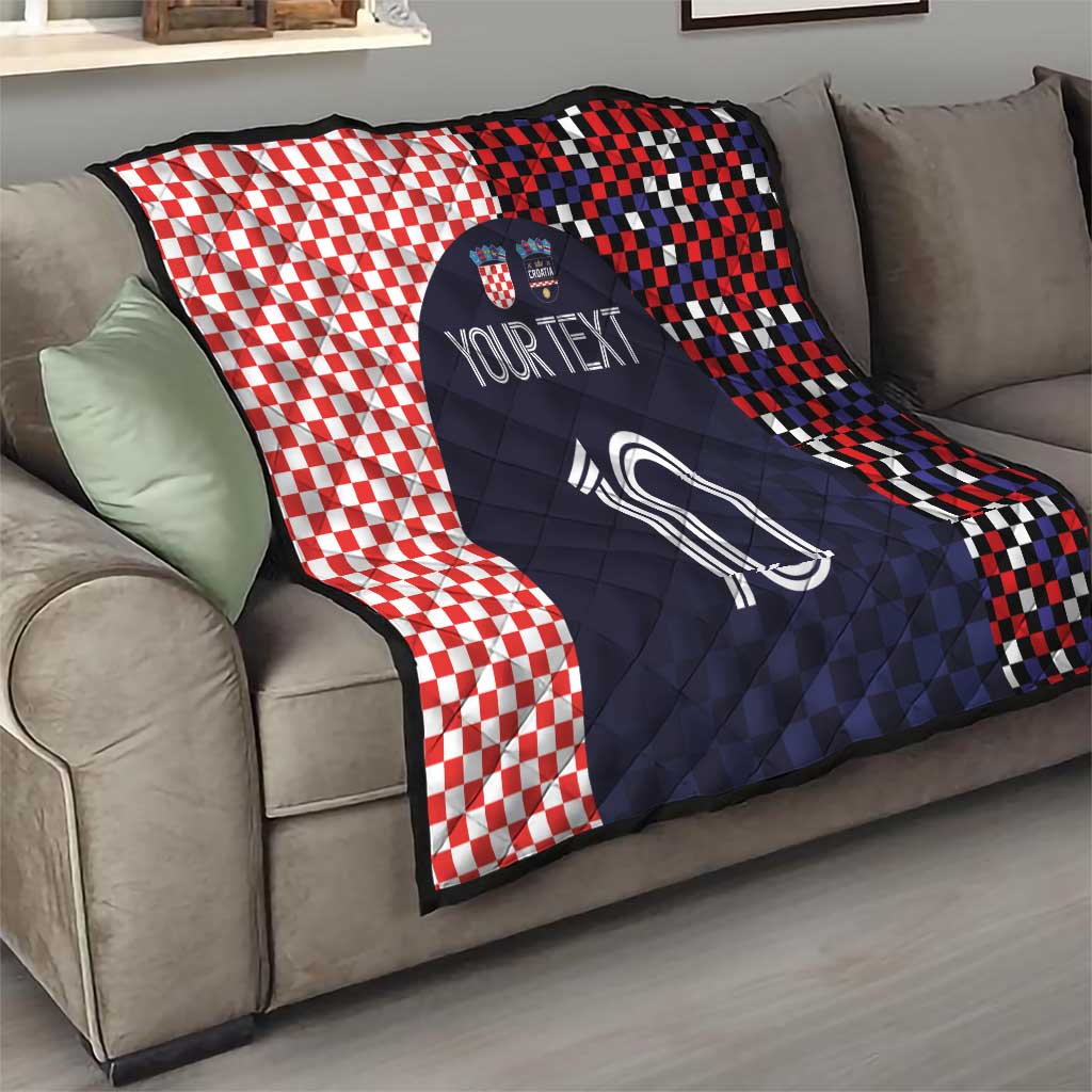 Customizable quilt with red-and-white checkered and dark navy geometric panels, soccer-style 10