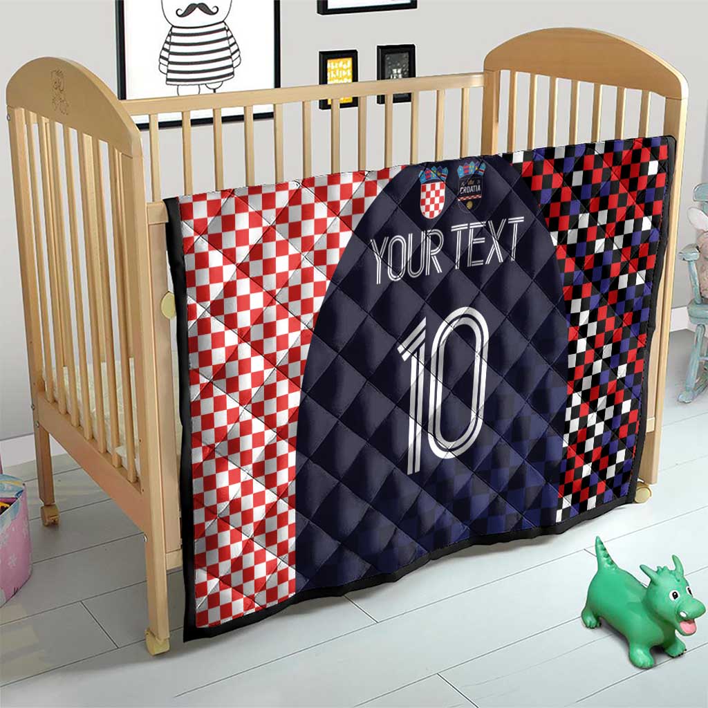 Dark navy quilt with red-and-white checker blocks and a large soccer number 10
