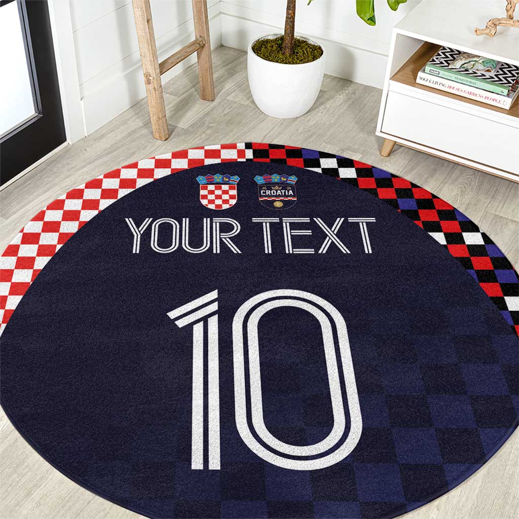 Round dark-navy checkered soccer rug with crest, '10', and 'YOUR TEXT' print.