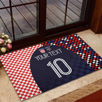 Rubber doormat with red-and-white checkered side and navy center showing your text and 10