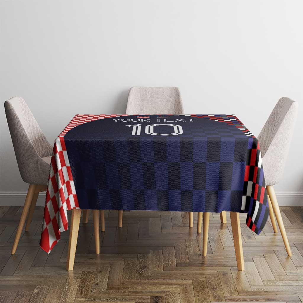 Round tablecloth in dark navy checkered with red and white edges and central number design