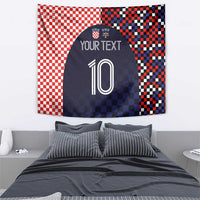 Wall tapestry above bed: red checkered and dark navy pixel pattern with 'YOUR TEXT' and number 10