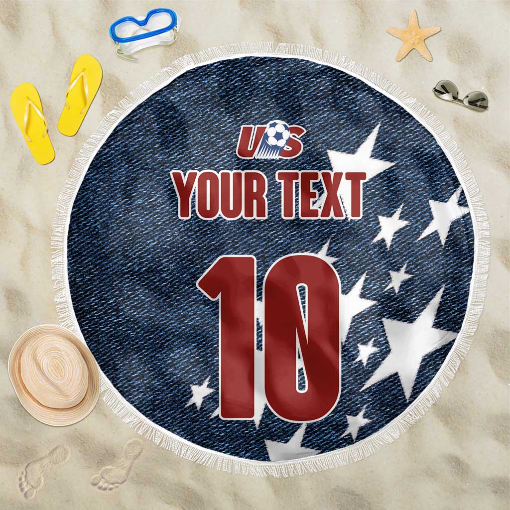 Round navy denim-style beach blanket with fringe edge, US soccer logo and large “10” graphic