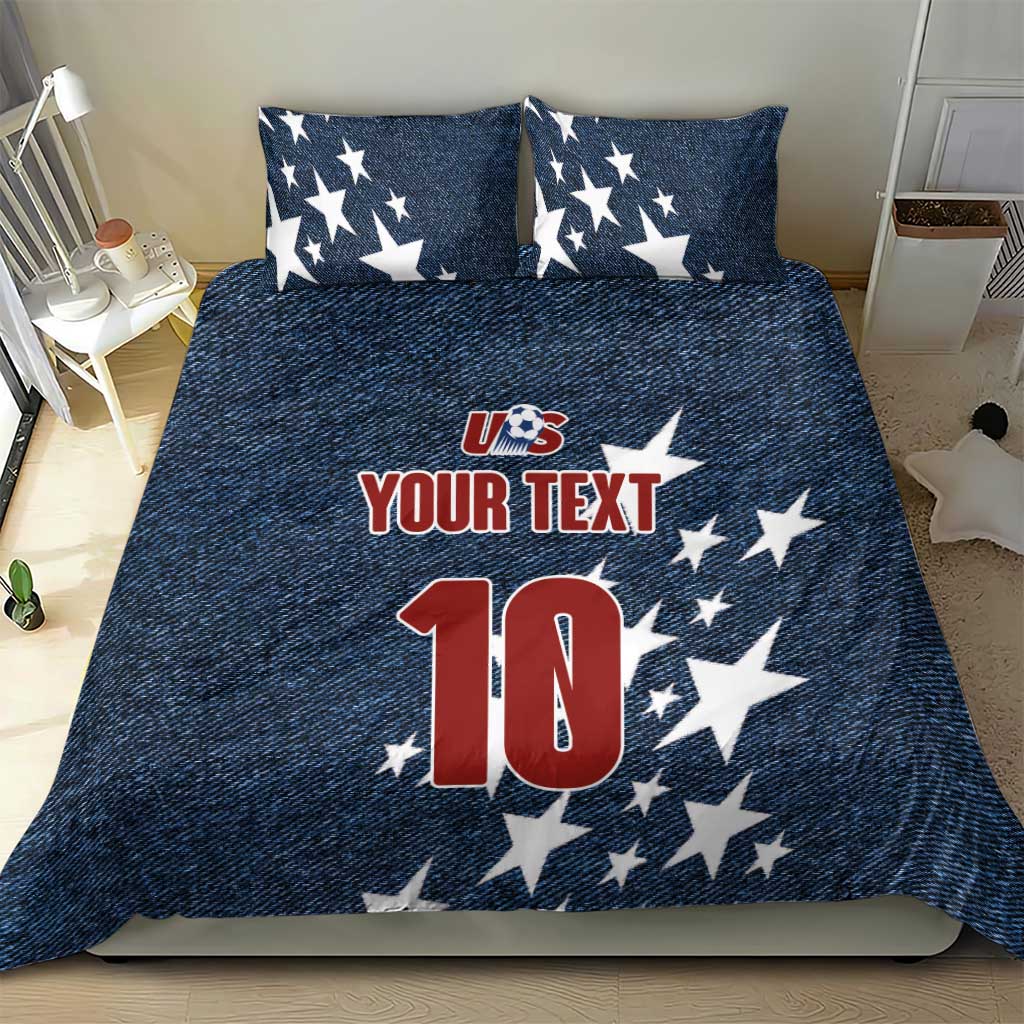 Denim-style bedding set with navy star pillows and comforter featuring US logo, 'YOUR TEXT' and '10'