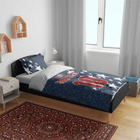 Denim-style bedding set with navy star comforter featuring US logo, 'YOUR TEXT' and '10' with pillows