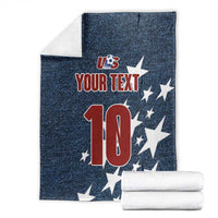 Navy denim-style soccer blanket with US logo, stars, custom text, and number 10, folded
