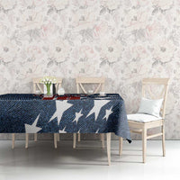 Navy denim-style tablecloth with white star motifs on dining table