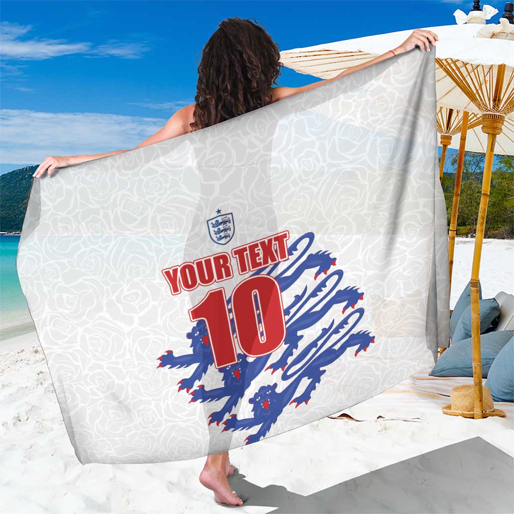 Custom England football sarong laid flat, shows 'YOUR TEXT 10' red-blue design