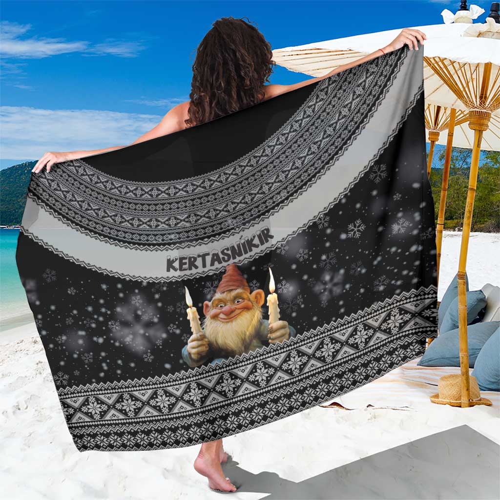 Black sarong towel with Nordic border, star speckles, and bearded Santa graphic