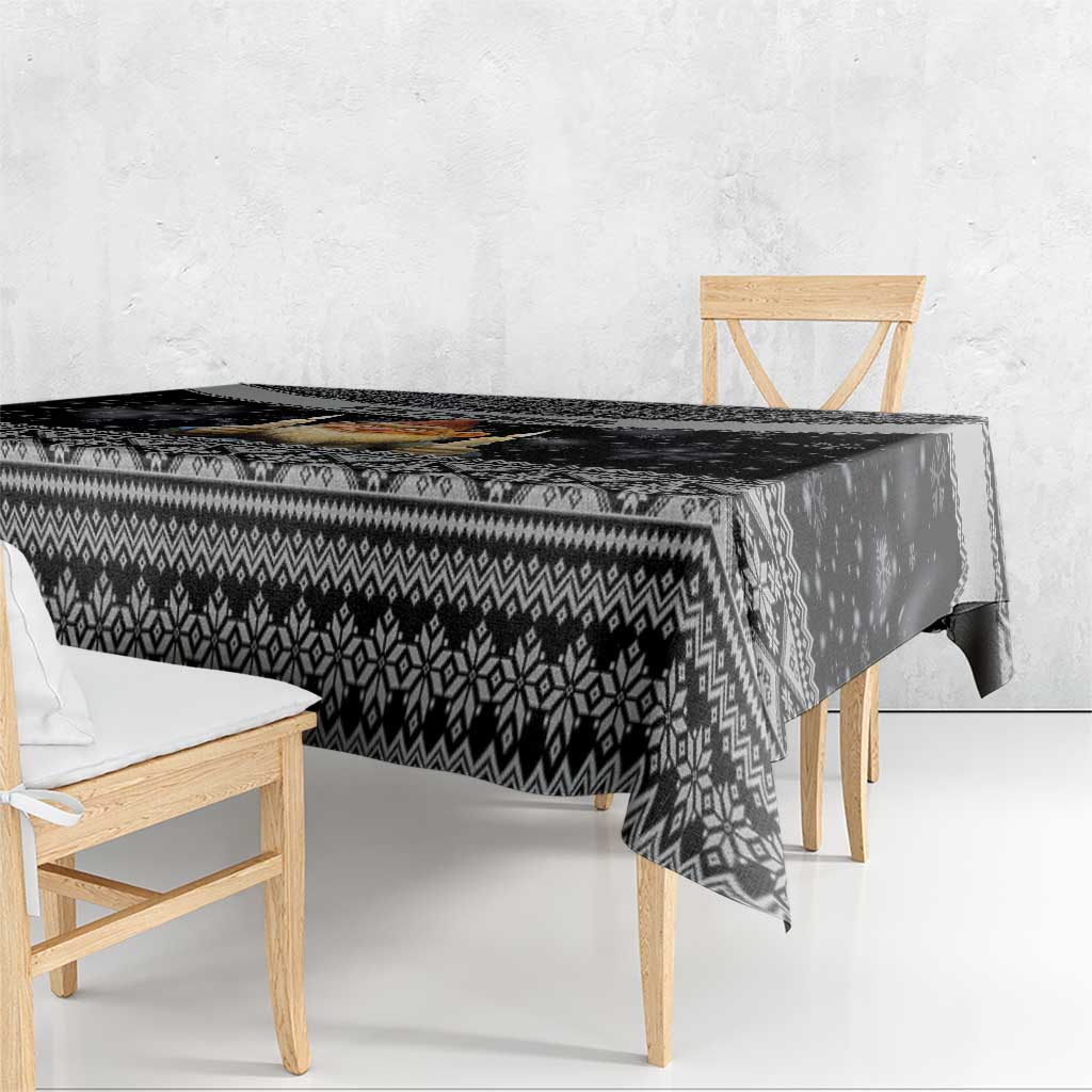 Black Nordic Christmas tablecloth with geometric stripes and diamond motifs, draped edge