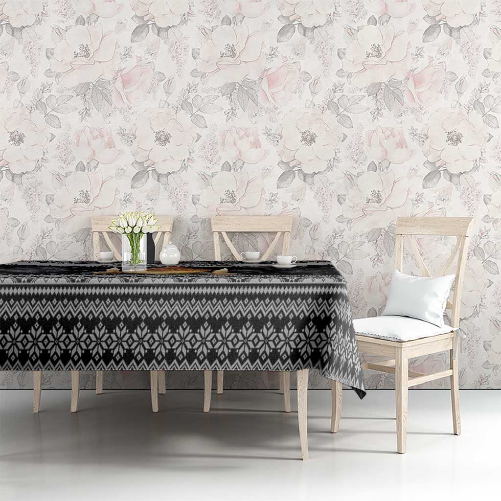 Black Nordic-pattern tablecloth with diamond and snowflake designs, table centerpiece