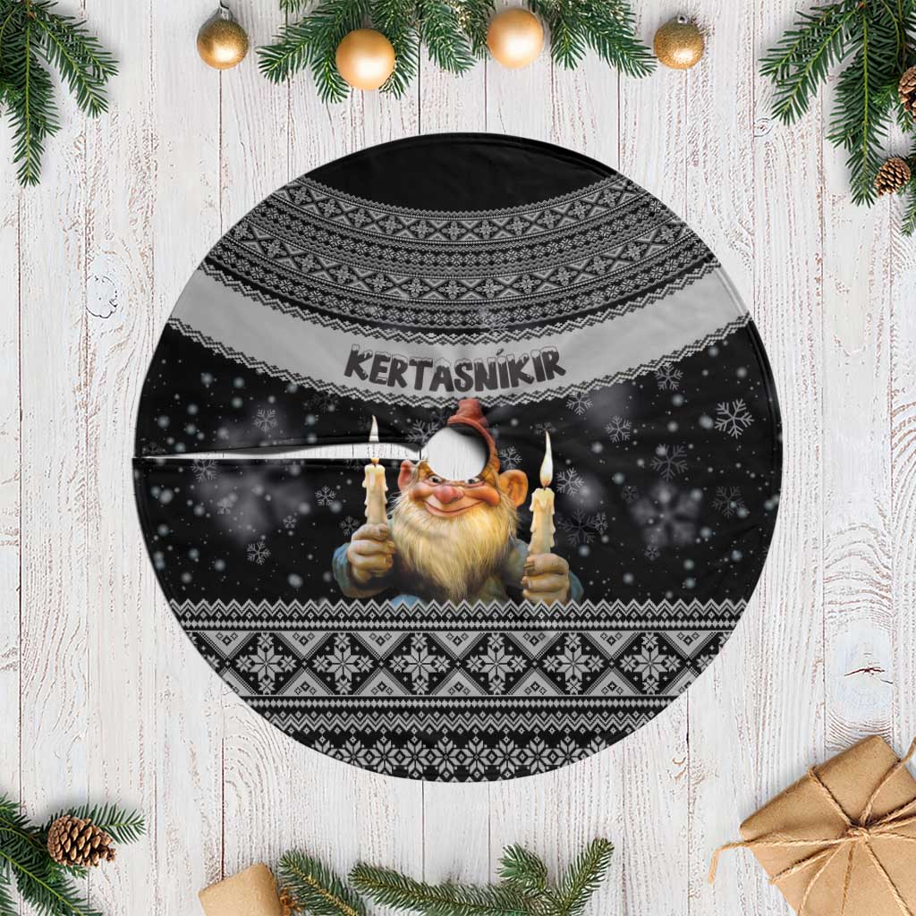 Black round Christmas tree skirt with white fringe, Nordic pattern and candle gnome graphic