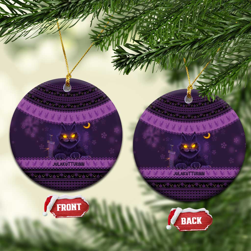 Dark purple round ceramic cat Christmas ornament with gold hanging loop and Nordic pattern.