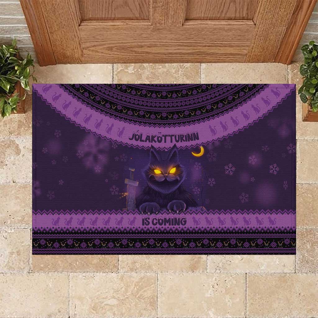 Dark purple Christmas rubber doormat with cat face, moons, and Nordic border pattern
